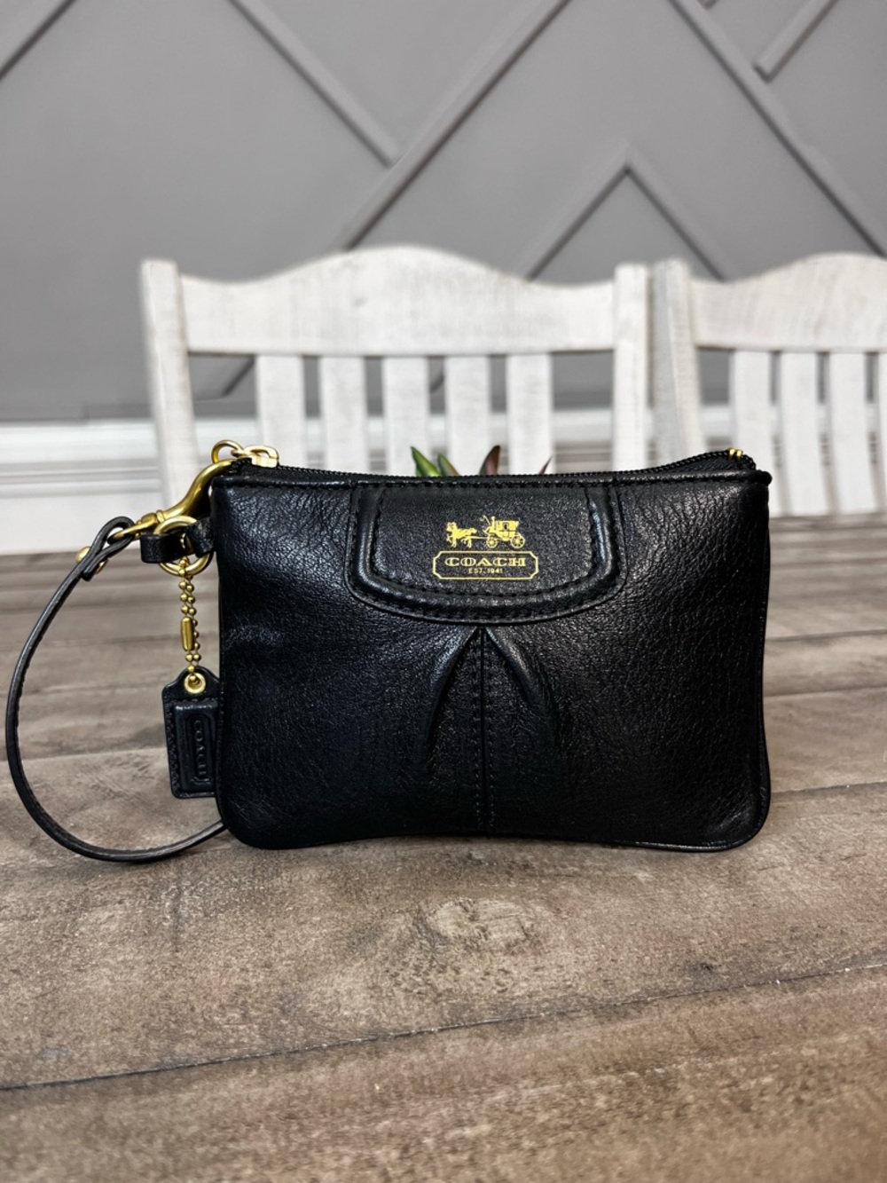 Madison black pebbled leather wristlet featuring gold-tone hardware - Picture 3 of 5